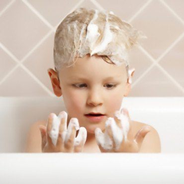 How to Treat Kids with Head Lice - Child in Bath - NitWits
